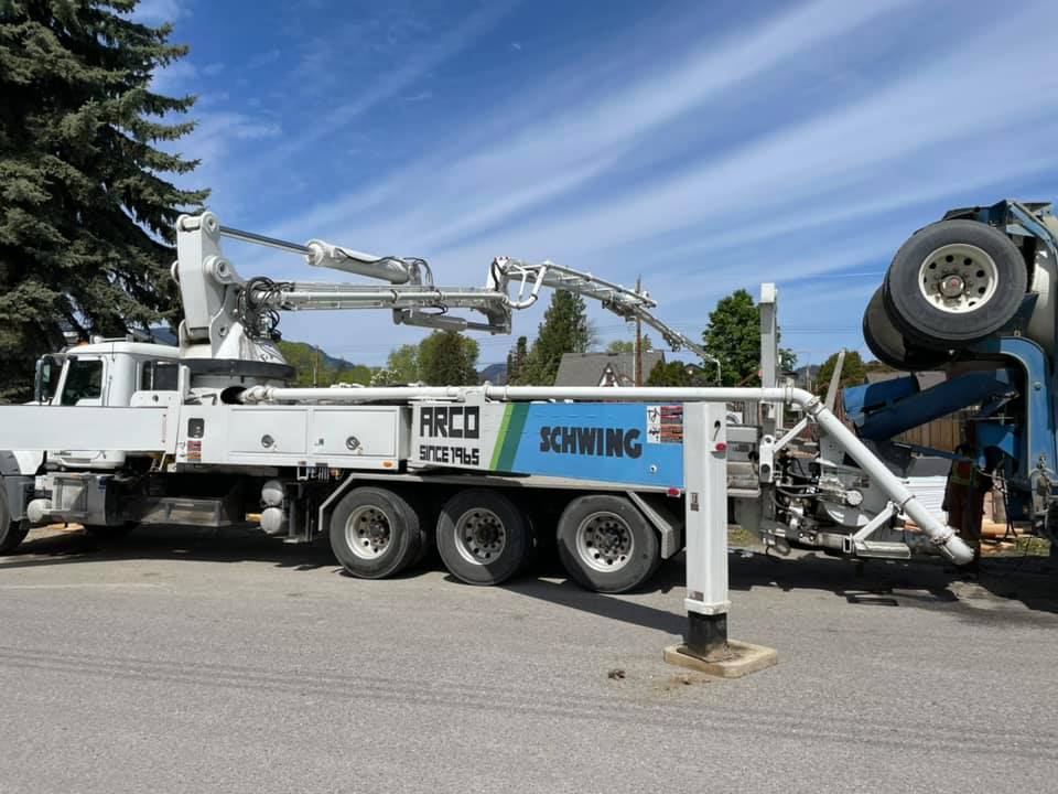 Arco Concrete Service | Arco Schwing concrete pumping truck side view